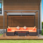 Pergola grise avec salon et coussins orange