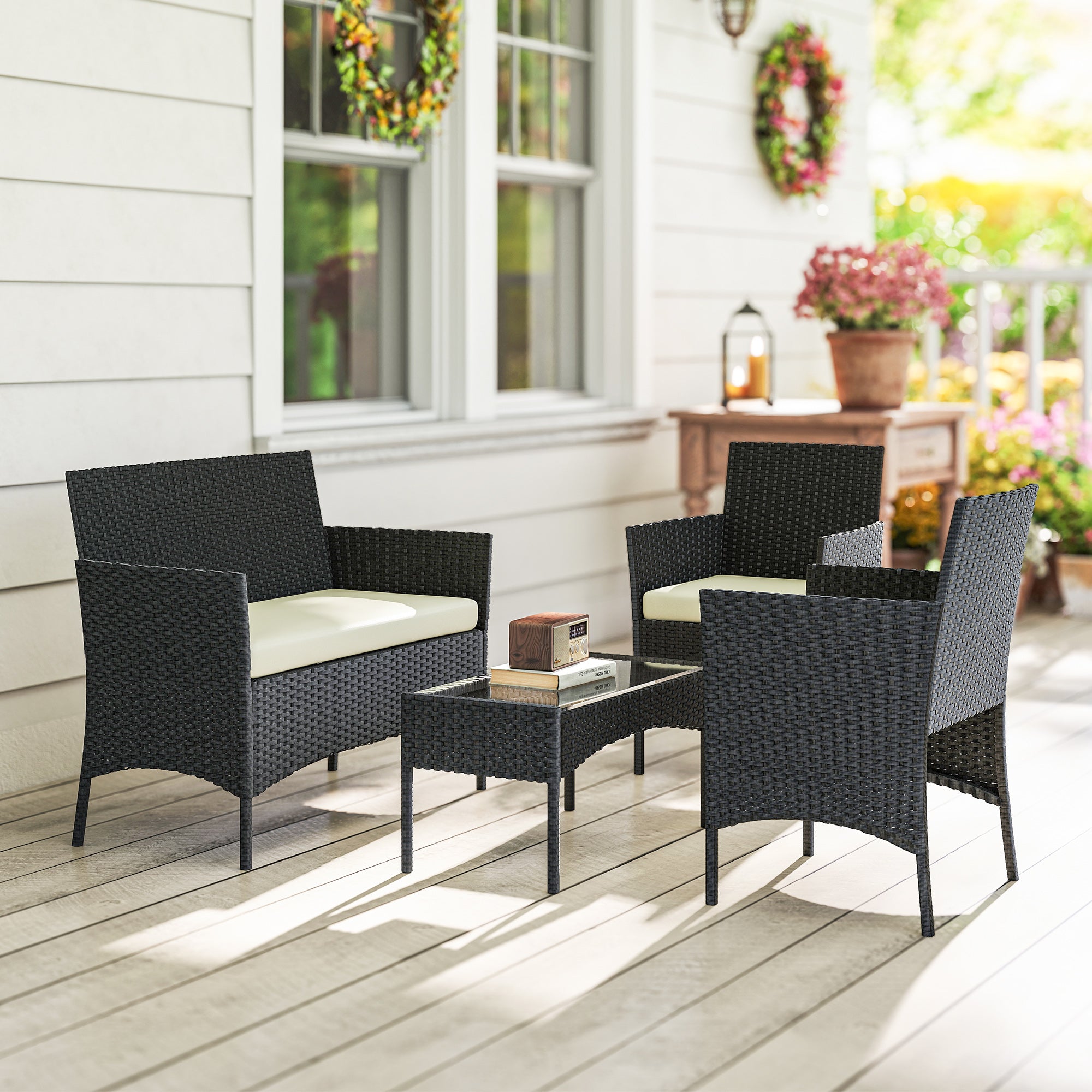 Solarias Ensemble mobilier de jardin en rotin synthétique avec canapé, fauteuils et table en verre trempé et coussins Noir e